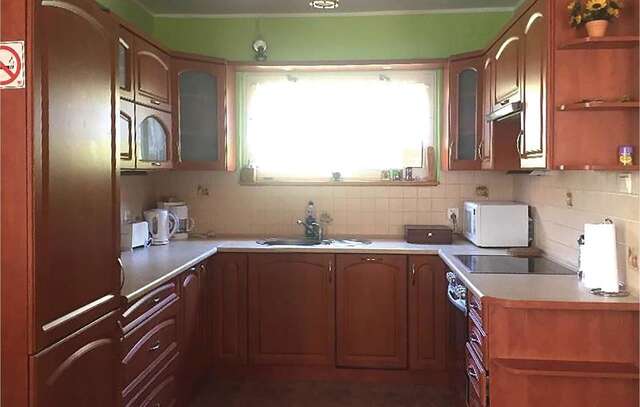 Дома для отпуска Three bedroom holiday home in Sikorzyno Голубе-13